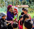 Ha Giang, Vietnam - November 08, 2018: Unidentified group of children wearing Hmong traditional new year clothe, waiting for their