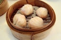 Ha-kao Shrimp Dumplings dim sum in a bamboo steamer box, Chinese cuisine