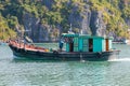 FIsherman boat in Ha long Bay in Vietnam Royalty Free Stock Photo