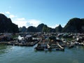 Houses in a floating fishing village in Ha Long Bay. Vietnam Royalty Free Stock Photo