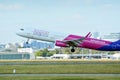 HA-LXM - Airbus A321-231 - Wizz Air is flying from the runway of Warsaw Chopin Airport Royalty Free Stock Photo