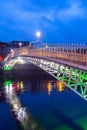 Ha'penny Bridge over Liffey river in Dublin, Ireland.