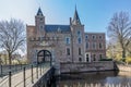 Haamstede in Schouwen-Duiveland, Zeeland, The Netherlands. April 26, 2021. Old Haamstede Castle with its bridge and moat Royalty Free Stock Photo