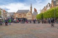 Haarlem/Holland - October 06 2019:  People walking and cycling in city center. Haarlem is the capital of the province of North Royalty Free Stock Photo