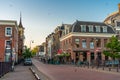 Haarlem, The Netherlands - May 31, 2019: Cozy green little street in Haarlem. Concept social inclusion and climate change