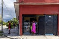 Small shop in Havana with a woman buying produ