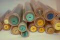 Haberdashery buttons in tubes