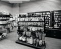 Haberdashery store with customers black and white