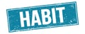 HABIT text on blue grungy rectangle stamp