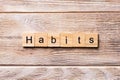 HABITS word written on wood block. HABITS text on wooden table for your desing, concept Royalty Free Stock Photo