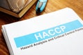 HACCP Hazard Analysis and Critical Control Points report on table Royalty Free Stock Photo