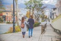 Two beautiful woman walking on the street in Hachiman-zaka slop, Japan