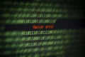 Hacked computer technology binary code number data alert ! Hacker error on display screen