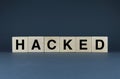 Hacked. Cubes form the word Hacked