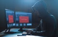 Hacker with access denied messages on computer Royalty Free Stock Photo