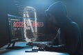 Hacker with access denied messages on computer Royalty Free Stock Photo