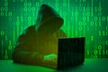 Hacker attack. Computer hacker coding on keyboard. Hacker working on code on dark green digital background. hacker virus malware Royalty Free Stock Photo