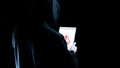 Hacker tablet cyber security. Digital mobile phone in hacker man hand isolated on black banner. Internet web hack Royalty Free Stock Photo