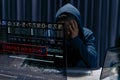Hacker in black hood use computer and failed in cyber attack through interne