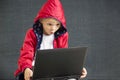 Hacker boy playing laptop Royalty Free Stock Photo