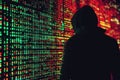 Hacker is breaching server room security, coding malware and stealing data from network Royalty Free Stock Photo