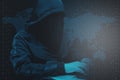 Hacker computer binary code system use laptop on world map.