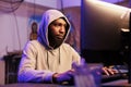 Hacker cracking password to gain access