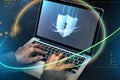 Hacker cracking the security code on a laptop Royalty Free Stock Photo