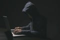 Hacker in darkness the access to steal information and infect