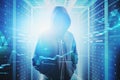 Hacker in data center, cyber security Royalty Free Stock Photo