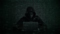 Hacker in data security concept. Hacker using laptop. Hacking the Internet. Cyber attack Royalty Free Stock Photo