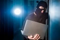 Hacker in a datacenter Royalty Free Stock Photo