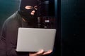 Hacker in a datacenter Royalty Free Stock Photo