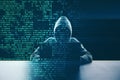 Hacker at desk using laptop with creative digital binary code dots hologram. Royalty Free Stock Photo