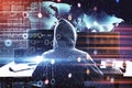 Hacker at desktop using computer and glowing world map Royalty Free Stock Photo