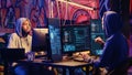 Hacker devising hacking plan together Royalty Free Stock Photo