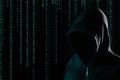 Hacker and digital binary code on background. Cyber crime concept Royalty Free Stock Photo