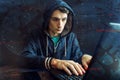 Hacker with a face is trying to steal cryptocurrency using a computer. Fraud at Cryptojacking Royalty Free Stock Photo