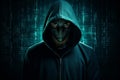 Hacker in front of a laptop in a dark room with city lights Royalty Free Stock Photo