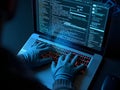 Hacker gloved hands using laptop computer, cyber attack risk concept Royalty Free Stock Photo