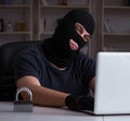 Hacker hacking computer late at night Royalty Free Stock Photo