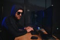 Hacker is hacking into the computer network. Computer criminal Royalty Free Stock Photo