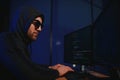 Hacker is hacking into the computer network. Computer criminal Royalty Free Stock Photo