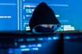 Hacker hacking computer password at night Royalty Free Stock Photo