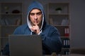 The hacker hacking the data late at night Royalty Free Stock Photo