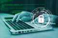 Hacker hand using keyboard typing bad data into laptop computer online system and spreading to global stolen personal information