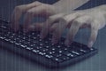 Hacker hands typing on computer keyboard Royalty Free Stock Photo