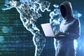 Hacker holding laptop and glowing world map Royalty Free Stock Photo