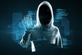 Hacker in hoodie using abstract blue coding and tech information hologram interface. Database, malware, cloud computing and Royalty Free Stock Photo