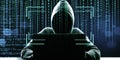 Hacker in hoodie using laptop at desktop on abstract binary code background with face recognition interface. Hacking, ID and Royalty Free Stock Photo